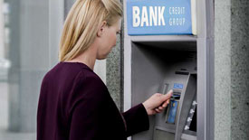 woman-at-atm-machine