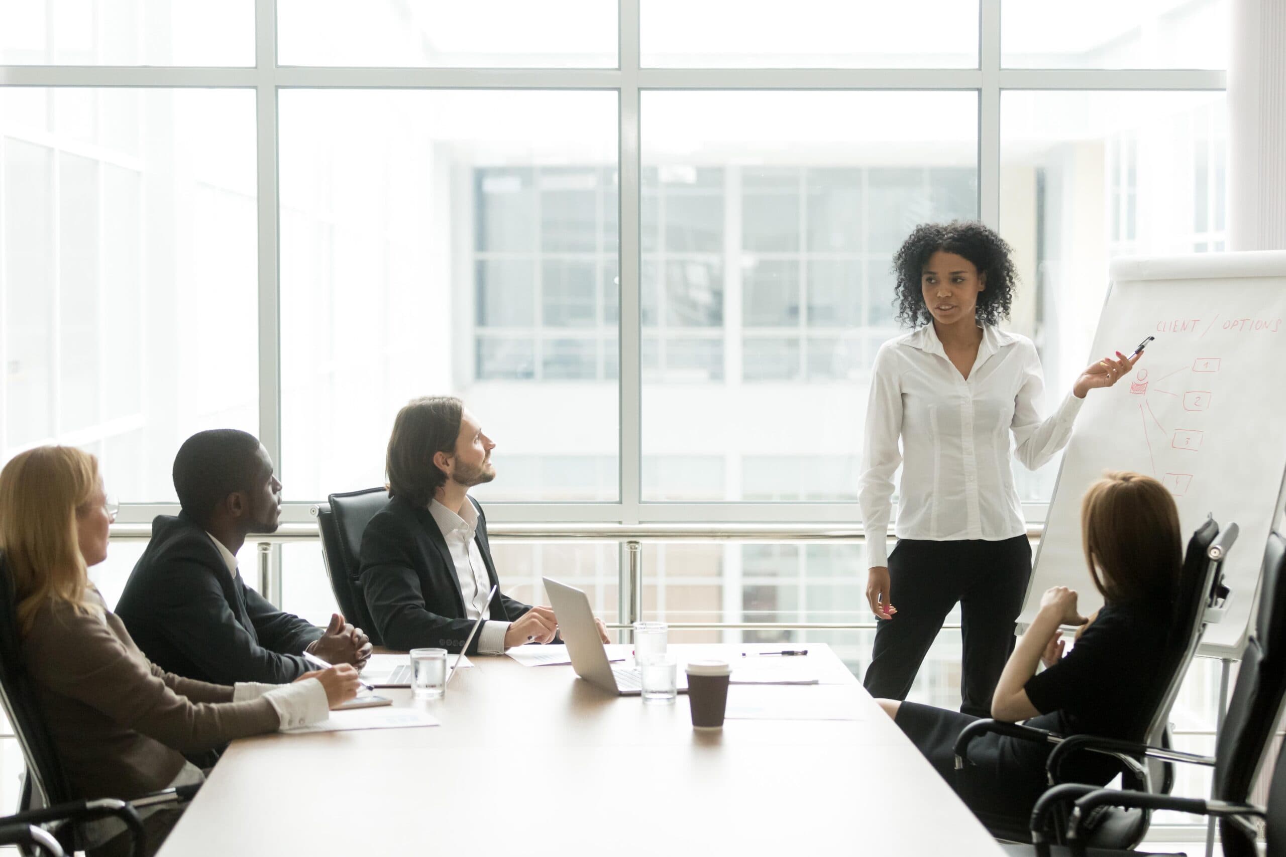 Businesswoman giving presentation in a meeting room