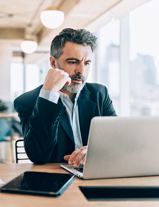 man looking at computer