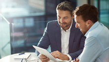 businessmen-looking-at-papers