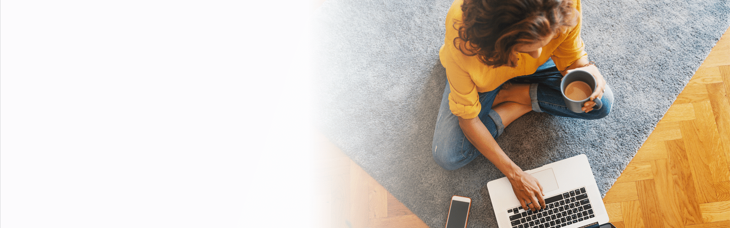 woman-sitting-on-floor-with-computer